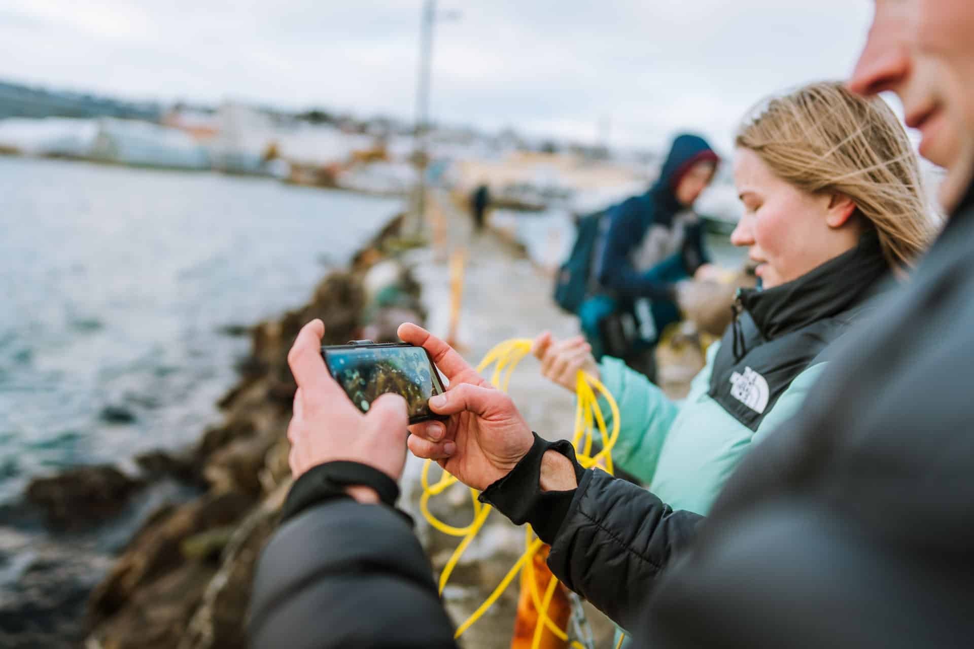 High School students at Sørsjetéen, steering an underwater vehicle.
