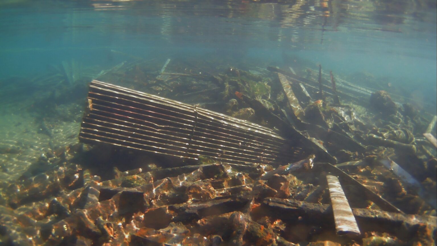 Debris from a shipwreck under the ocean.