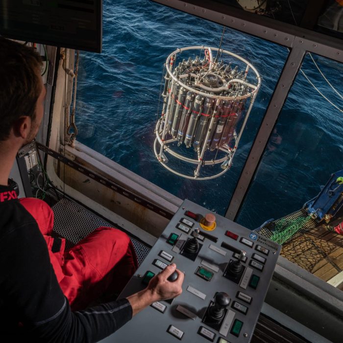 Arctic Frontiers - A researcher operates a control panel to lower an oceanographic instrument into the sea from a vessel, gathering vital data ahead of the Arctic Frontiers - Science 2026 conference.